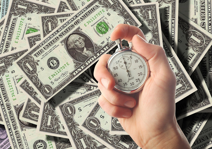 Loan amortization payment schedule — calculator, pen and financial charts showing principal vs interest breakdown over loan term